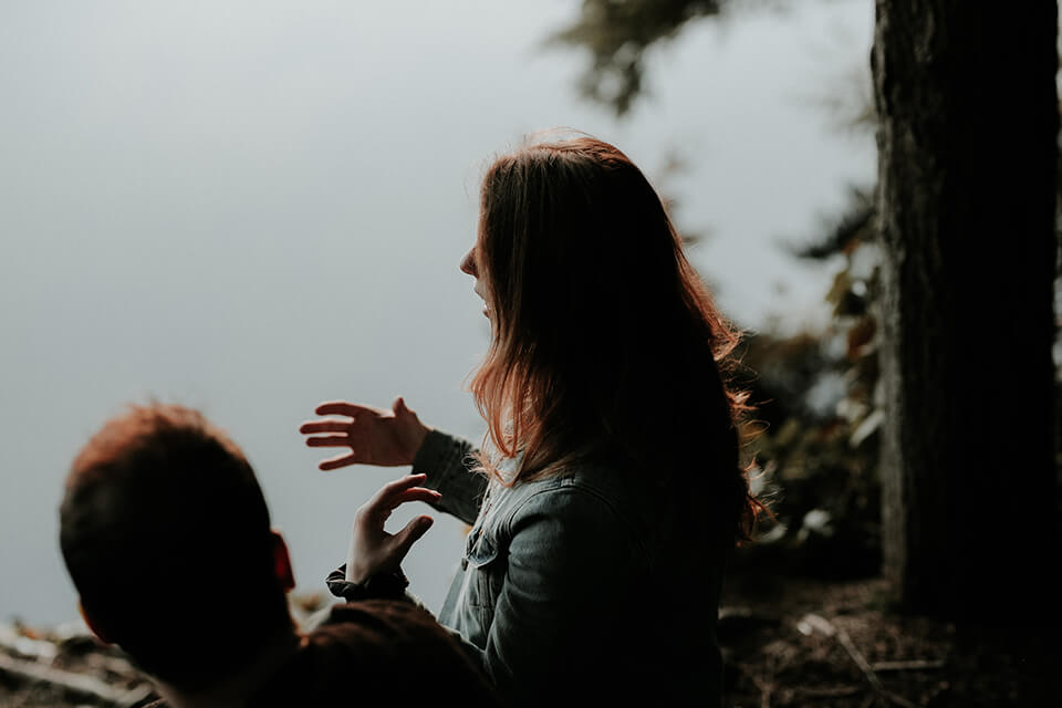 Woman having a deep conversation with a man