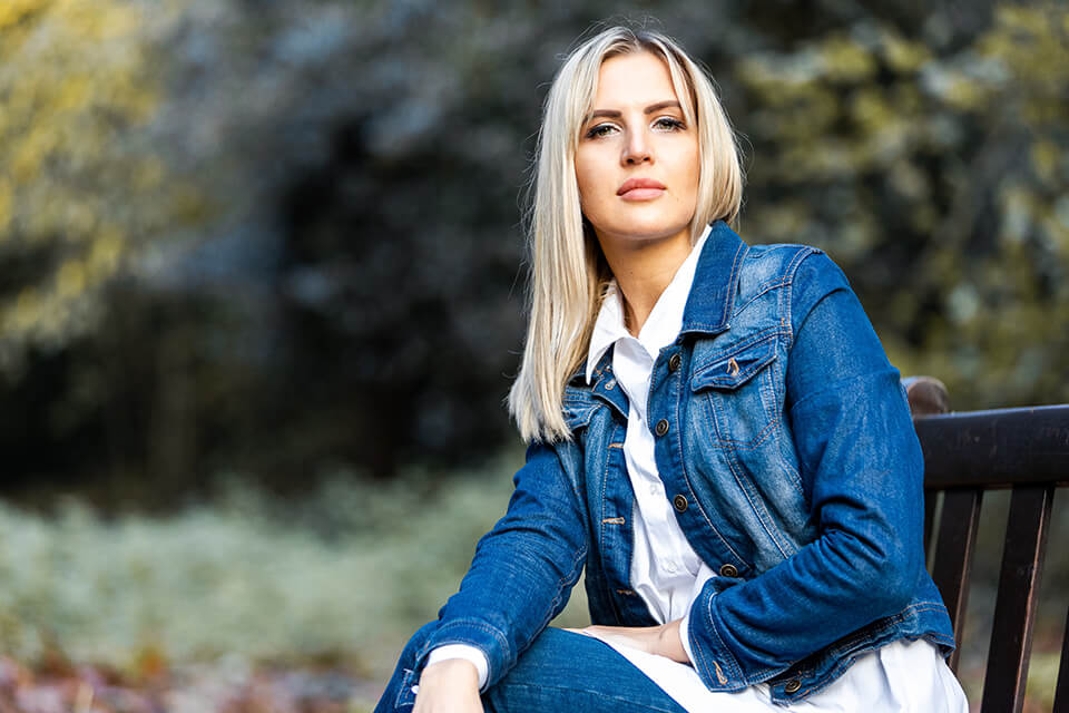 Woman looking confidently off into the distance.