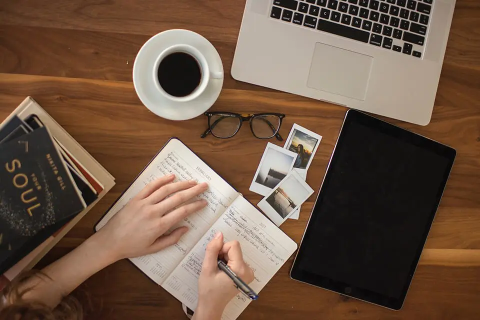 Women writing in her journal