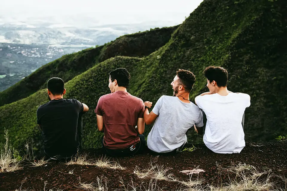 Friends sitting and laughing together