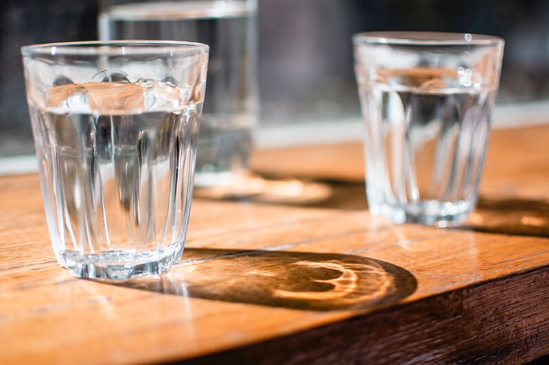 Glasses of water to keep you from falling asleep while meditating lying down