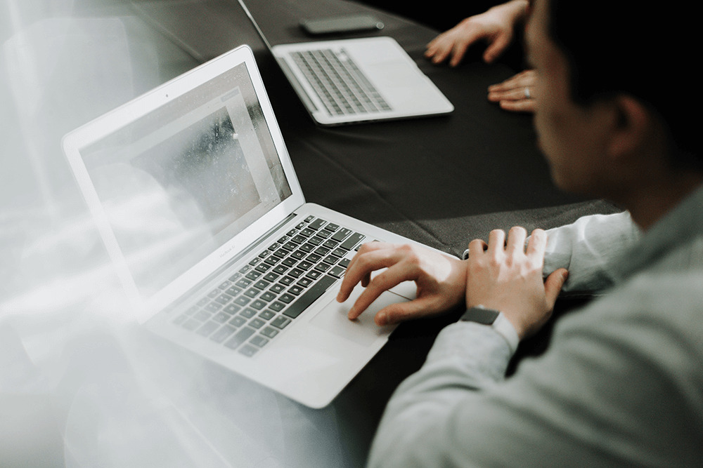 man working on laptop