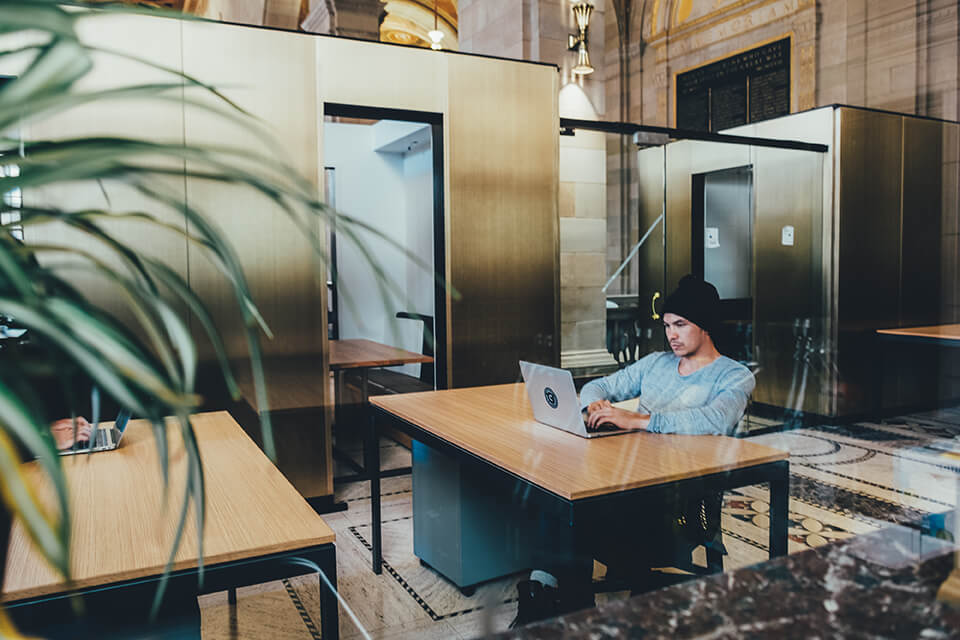 Man sitting at his desk, working in an office